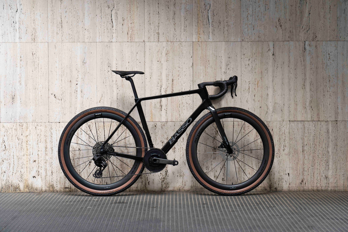 Drive side view of the Basso Palta III Carbon Chrome complete bicycle with Campagnolo 1x13-speed drivetrain and Scope Artech 4 wheels, custom built by Cicli Corsa.