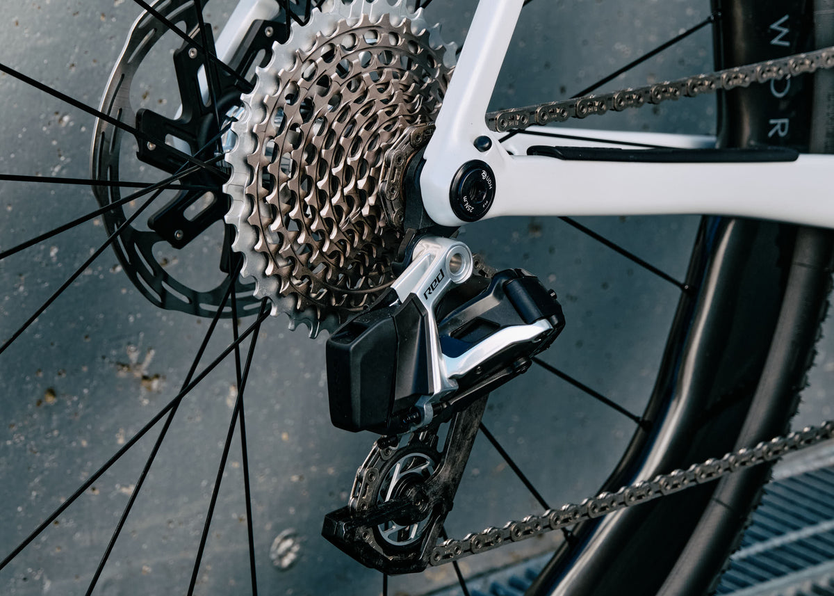 SRAM Red AXS wireless rear derailleur on the Colnago C68 Gravel complete bicycle by Cicli Corsa.