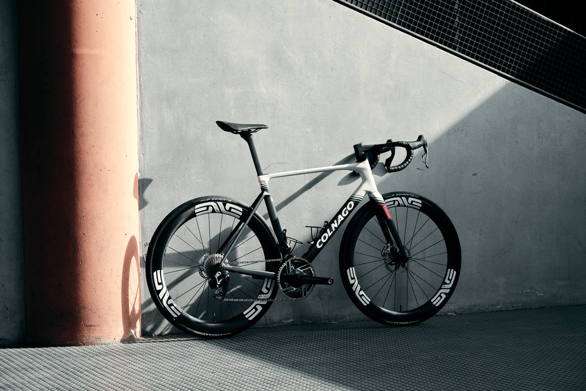 Non-drive side view of the Colnago V5Rs premium carbon road complete bicycle featuring Enve carbon wheels with white decals, assembled by Cicli Corsa.