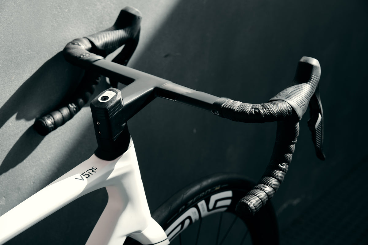 Enve premium wheel hub and SRAM Red hydraulic disc brake rotor on the Colnago V5Rs complete bicycle by Cicli Corsa.