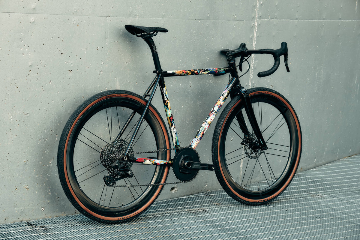 Rear view of the Dario Pegoretti Duende AR custom gravel and all-road complete bicycle highlighting the signature hand-built steel rear triangle, tailor-made by Cicli Corsa.